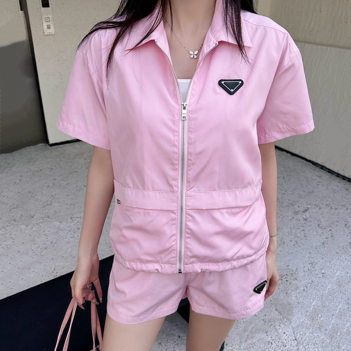 Designer Women's Tracksuits Nylon Fabrics Zip Double Pockets Design Casual Energetic Spring Summer Womens Short Sleeve Shirts Elasticated Waist Shorts