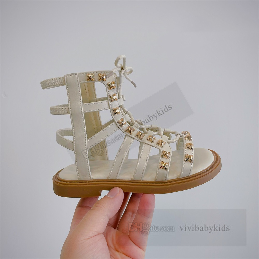 2024 Zomer kinderen Hollow Rivet Sandalen Girls Lace-Up Bows Non-Slip Beach Princess Gladiator Shoes Fashion High Top Girls Roman Sandals Z7452