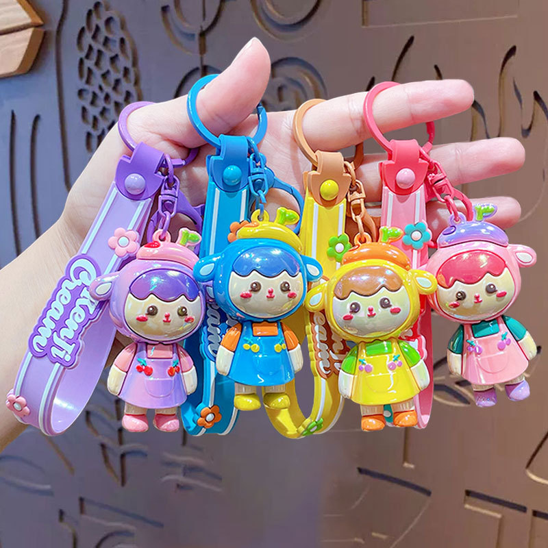 Cartoon dopamine color blocking keychains, PVC soft rubber car keychains, small gift pendants wholesale