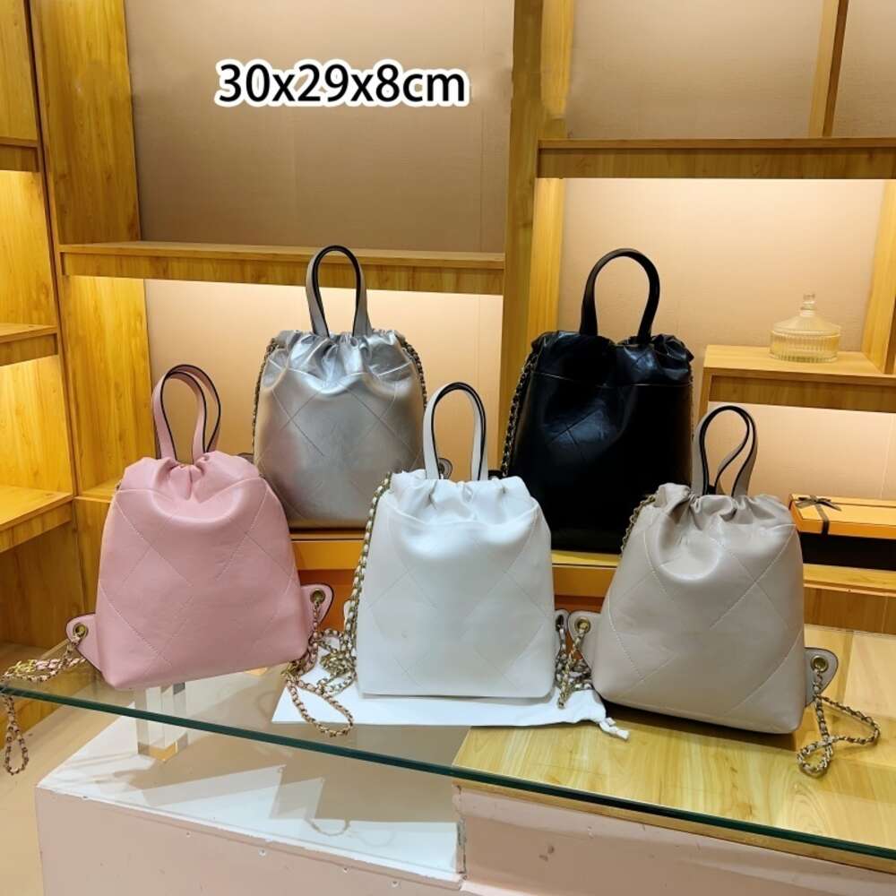 Sac à main en cuir Designer 50% de réduction sur les sacs de marque pour femmes d'exportation Été Nouveau style de mode Sac à main Chaîne Sac à dos Couleur Simple Grande capacité Épaule