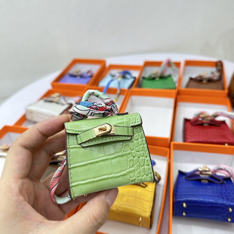 Schlüsselanhänger Designer-Damenaccessoires Mini Kylie Alligatorleder Rucksackbehänge Hochwertige Auto-Schlüsselanhängerringe Autobehänge