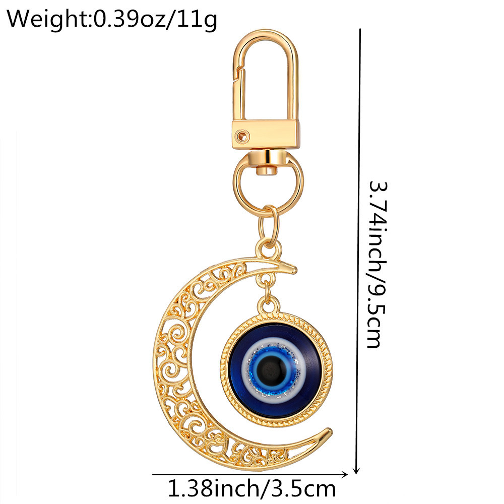 Blue Evil Eye Keychain alliage Righestone Palm Palle Pendre Key Ring Femmes Men Colorful Hollow Moon Coeur Charmes Lobster Backle Sac Car Clé ACCESSOIRES