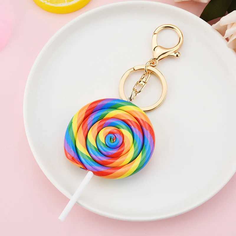 Keychains Lonyards Nouveau simulation arc-en-ciel Lollipop Keychain Car Sac Pendentif Résine Soft Céramique Small Gift K2309 Q240403