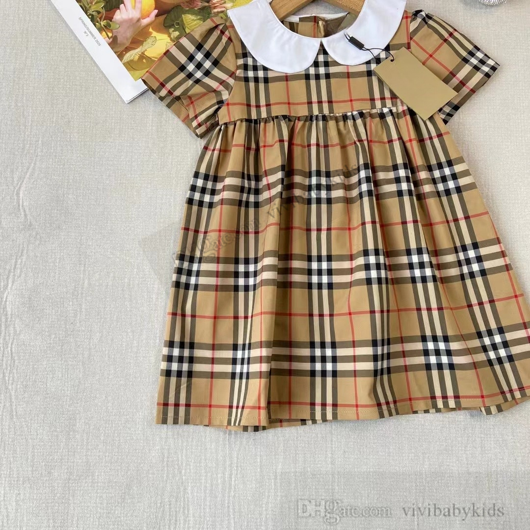 Preppy Style Girls Plaid Kleider Kids Doll Dorpe Short Sleeve Plissee Kleid 2024 Sommer Kinder Baumwollgitter Kleidung S1307