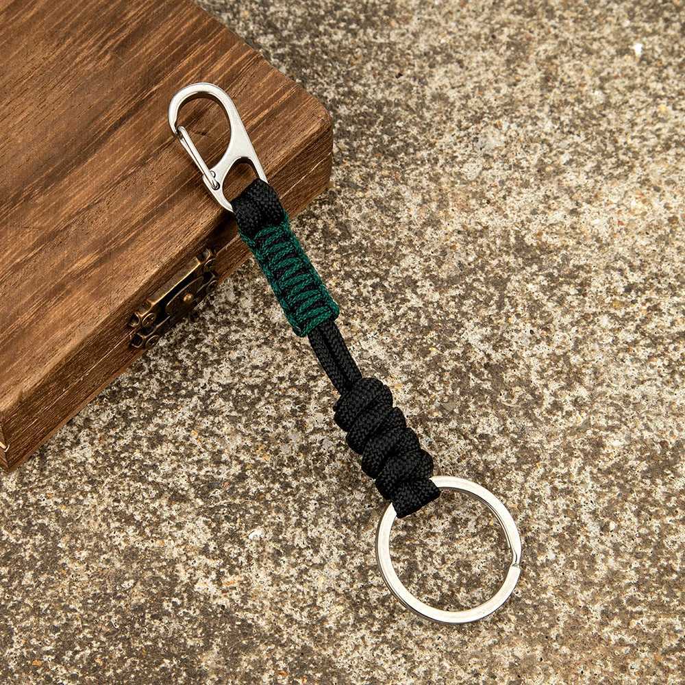 Keychains Lanyards MKENDN Double Chain Keychain Mens Handmade Weaving Outdoor Climbing Umbrella Rope Snake Knot Emergency Metal Keyring Q240403