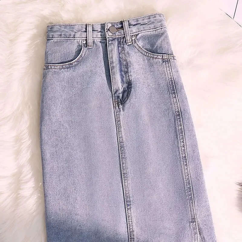 Jupes denim Femmes hautes taille vintage en détresse mince longue hanpre de hanche A-ligne élégante poche à fente de mode élégant harajuku moderne ol 240326