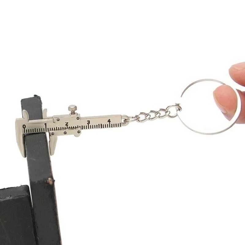 Keychains lanyards Nieuwe modeauto sleutel mini Vernier remklauw draagbaar 0-40 mm sleutelhanger meetinstrument gereedschap turbo ringmeter Q240403