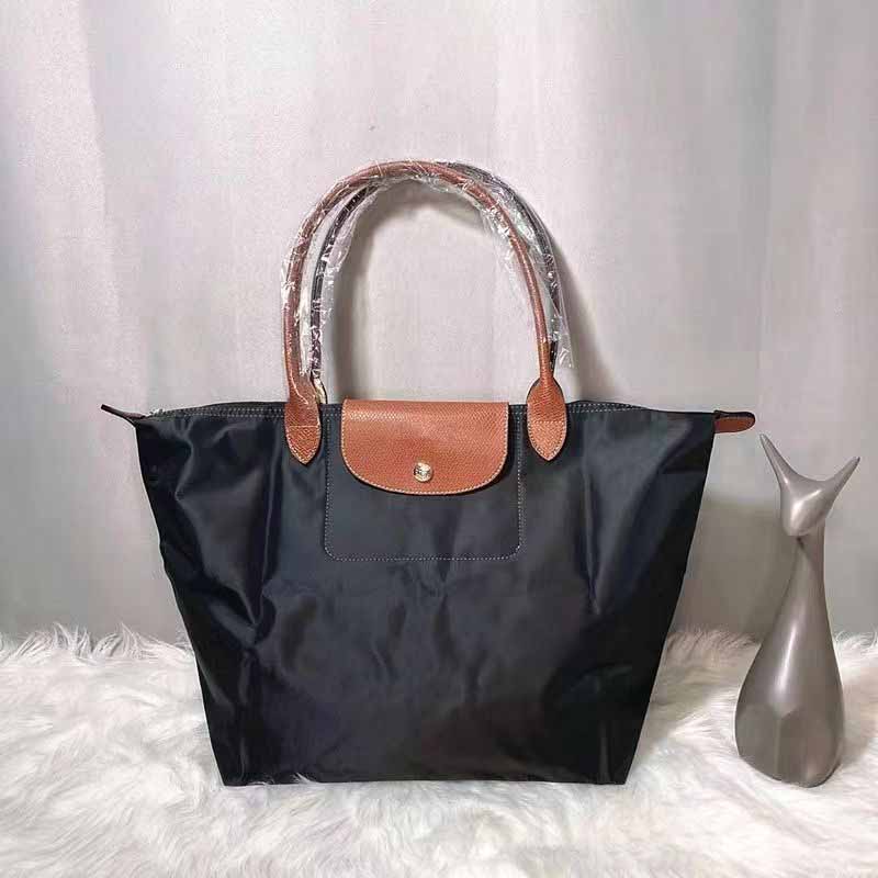 Lüks uzun şampiyon çantalar Tote moda tasarımcı çantaları chammp bayanlar yüksek kaliteli crossbody longchammp debriyaj totes siyah şampiyonlar katı renkli çantalar