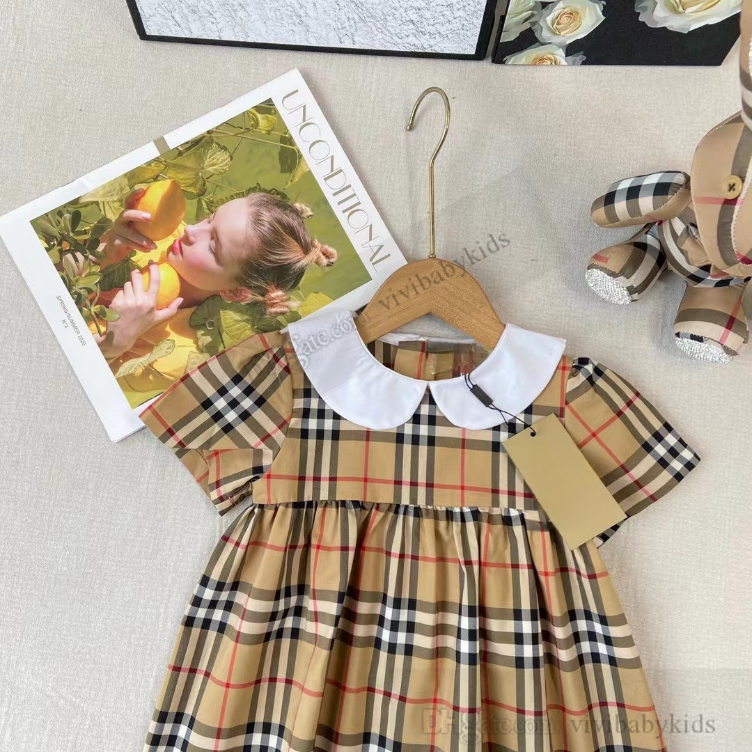 Preppy Style Girls Plaid Kleider Kids Doll Dorpe Short Sleeve Plissee Kleid 2024 Sommer Kinder Baumwollgitter Kleidung S1307