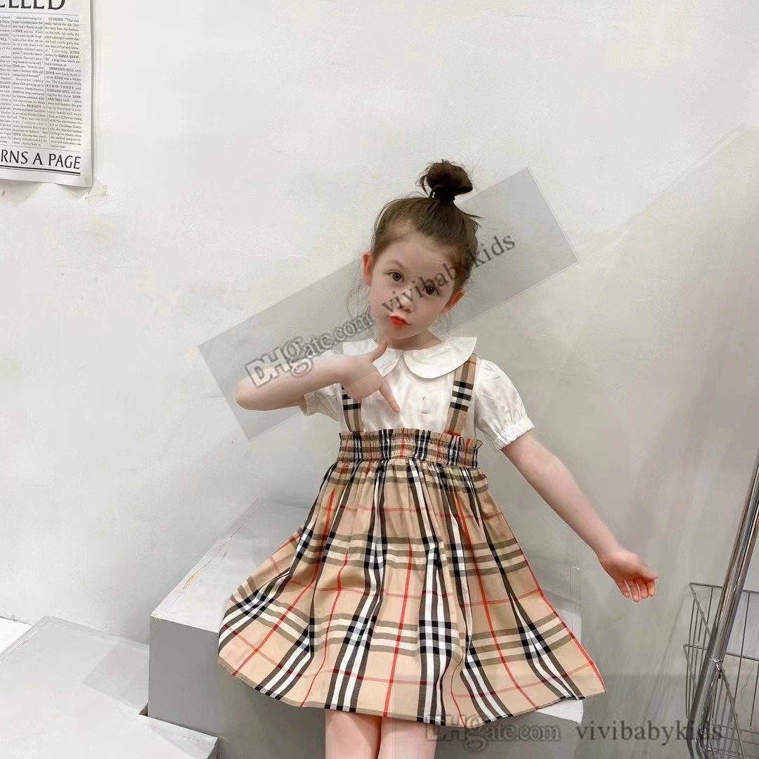 Ins Girls Letter Plaid Dresses England Style Kids Doll Lapel Short Sleeve Pleated Dress Children Bomullsgitterkläder S1310