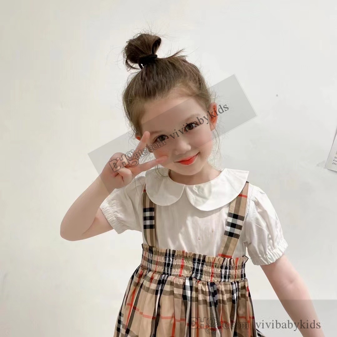 Ins Girls Letter Plaid Dresses England Style Kids Doll Lapel Short Sleeve Pleated Dress Children Bomullsgitterkläder S1310
