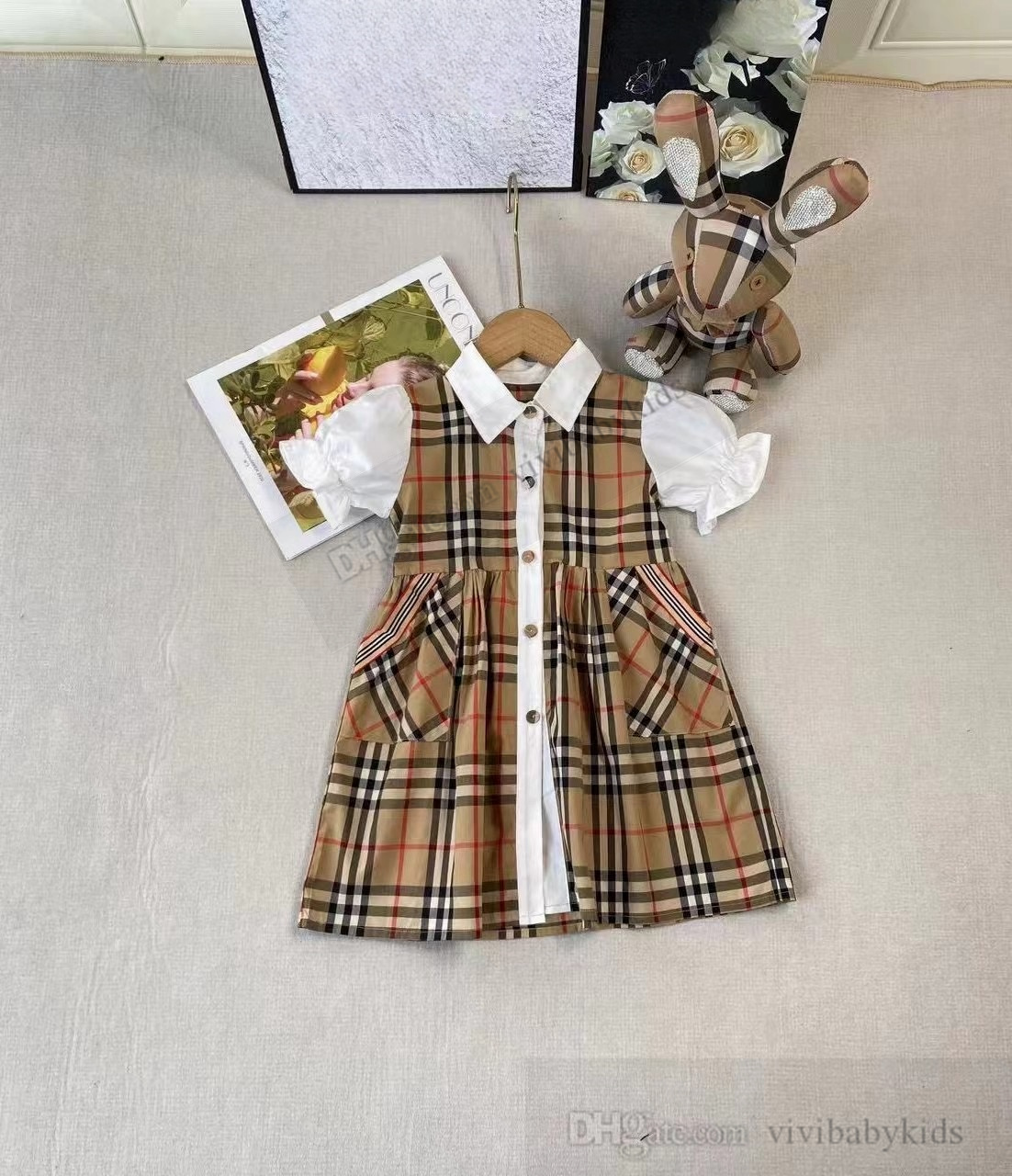 Preppy Style Girls Plaid Kleider Kids Kids Puff Kurzarm Plissee Kleid 2024 Sommer Kinder Baumwollgitter Kleidung S1309