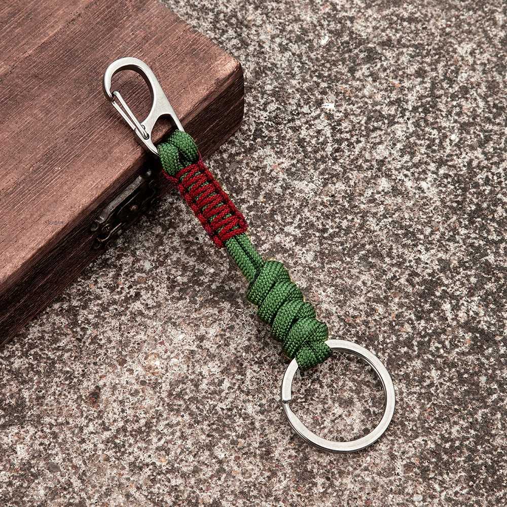 Keychains Lanyards MKENDN Double Chain Keychain Mens Handmade Weaving Outdoor Climbing Umbrella Rope Snake Knot Emergency Metal Keyring Q240403