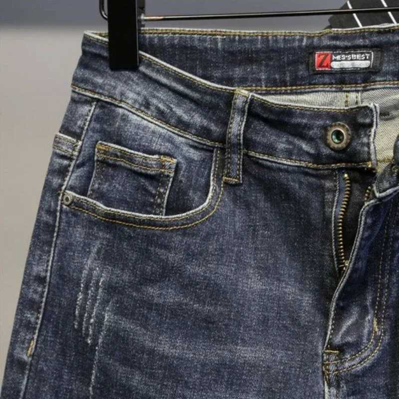 Mäns jeansbyxor ultratunna passande snäva monterande män jeans med trasiga snäva monterande mens jeans lappar perforerade trasiga fashionabla och softl2403