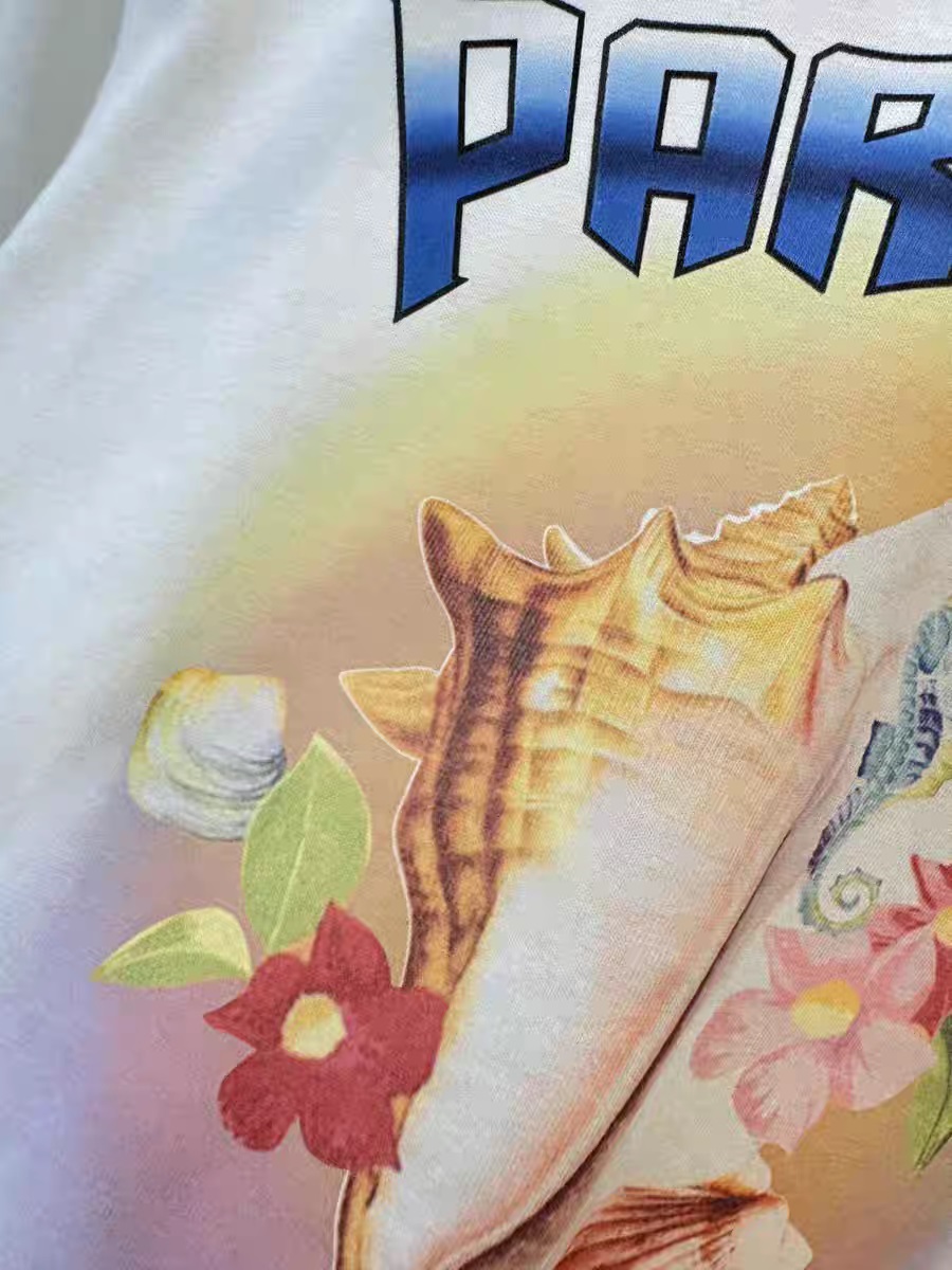 2024 Summer Ny retro Leisure Fashion Shell Letter Flower Printed T-shirt gjord av ren bomull mångsidig lös innerlager topp kortärmad vit t-shirt