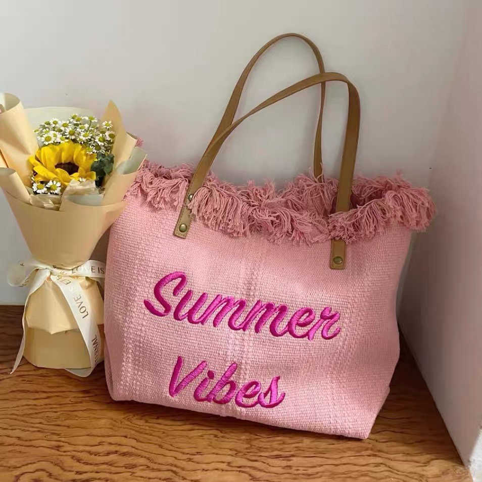 Women's Large Capacity 2023 New Canvas Bag Beach Bag One Shoulder Handheld Tote Bag Versatile Tassel Mommy Bag 240408