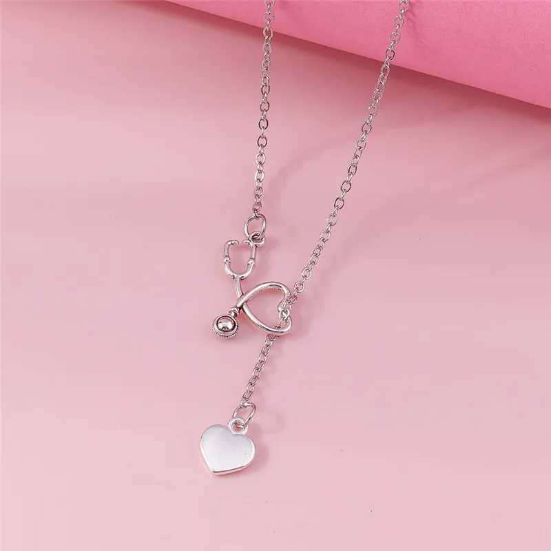 Pendant Necklaces Fashionable and Stylish Stethoscope Necklace Lariat Heart shaped Pendant Silver Nurse Medical NecklaceQ