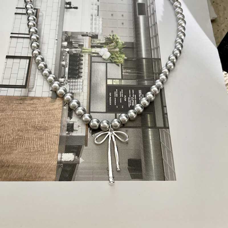 Colares pendentes de colar de arco retrô moderno jóias requintadas e colar elegante de arco de pérola adequado para meninas requintadas joias presentesq
