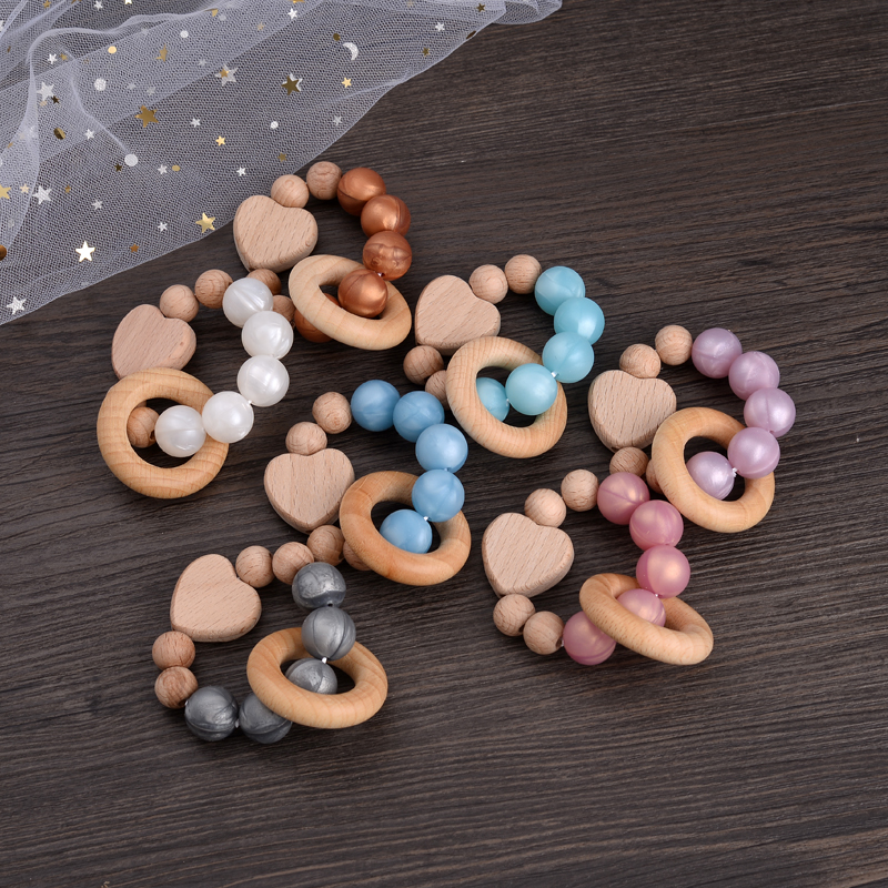 Braccialetti bambini Braccialetti siliconici perle rotonde a forma di cuore Anello di faggio in legno giocattolo bambini la dentizione anello di artigianato