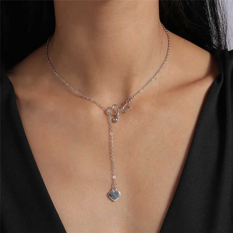 Pendant Necklaces Fashionable and Stylish Stethoscope Necklace Lariat Heart shaped Pendant Silver Nurse Medical NecklaceQ