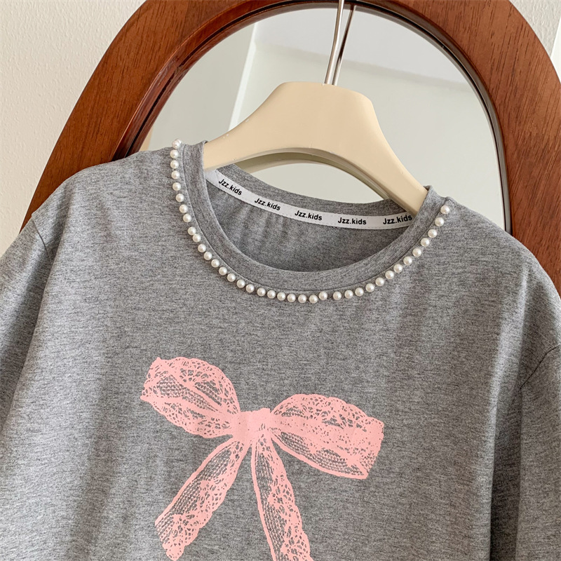 T-shirt imprimé à l'arc des enfants Ins bébé filles perle en dentelle de perle à manches courtes t-shirts rose gâteau de pétale jupes enfants coton tops décontractés 2-7t s1315