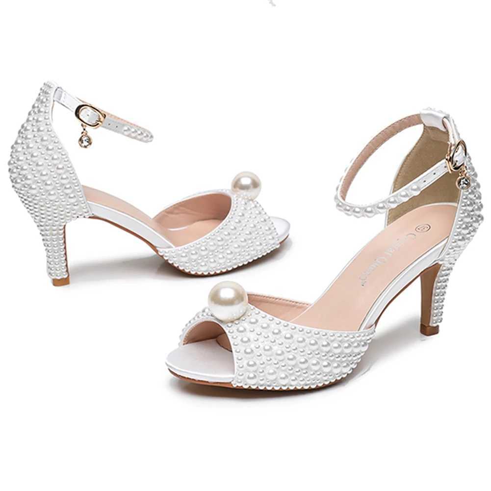 Scarpe eleganti Crystal Queen Fashion Women Open Hight Teli Lady Luxury Wedding Banquet White Pearl Sandals Stiletto H240409 IH5G