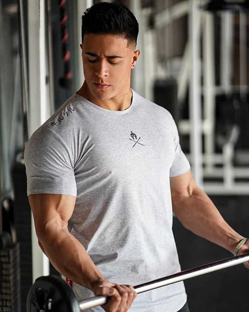 Camisas casuales para hombres Tamisas para hombres Fashion Summer Bodybuilding Carta impresa Men Fitness Fitness Entrenamiento de cuello de ojo Músculo 2449