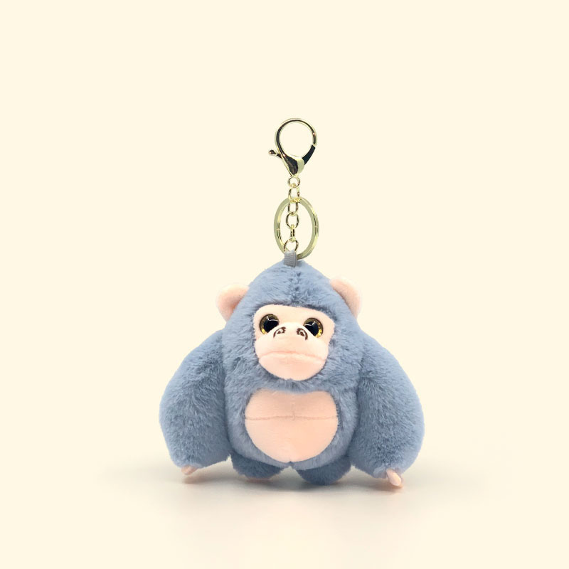 Nouveau gorille idiot et mignon à quatre couleurs, poupée de jouet en peluche de babouin diamant, porte-clés, pendentif de machine à poupée Grab