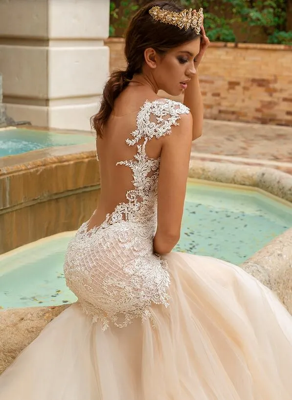 Crystal Design Mermaid Wedding Dresses Sexy See Through Back Champagne Lace Bridal Gowns Sweep Train Wedding Dress Vestido De Novia
