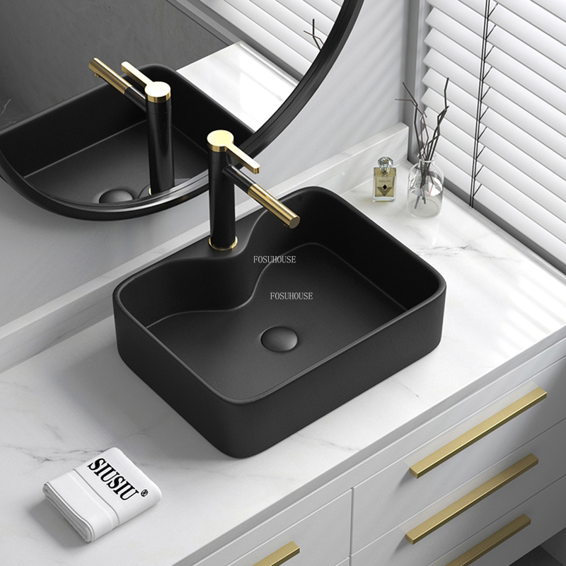 Modernt runda badrum sjunker svart keramisk bänkskivbassäng hushållens badrum tvättbaser nordiska hotell tvätt diskbänk enda bassäng