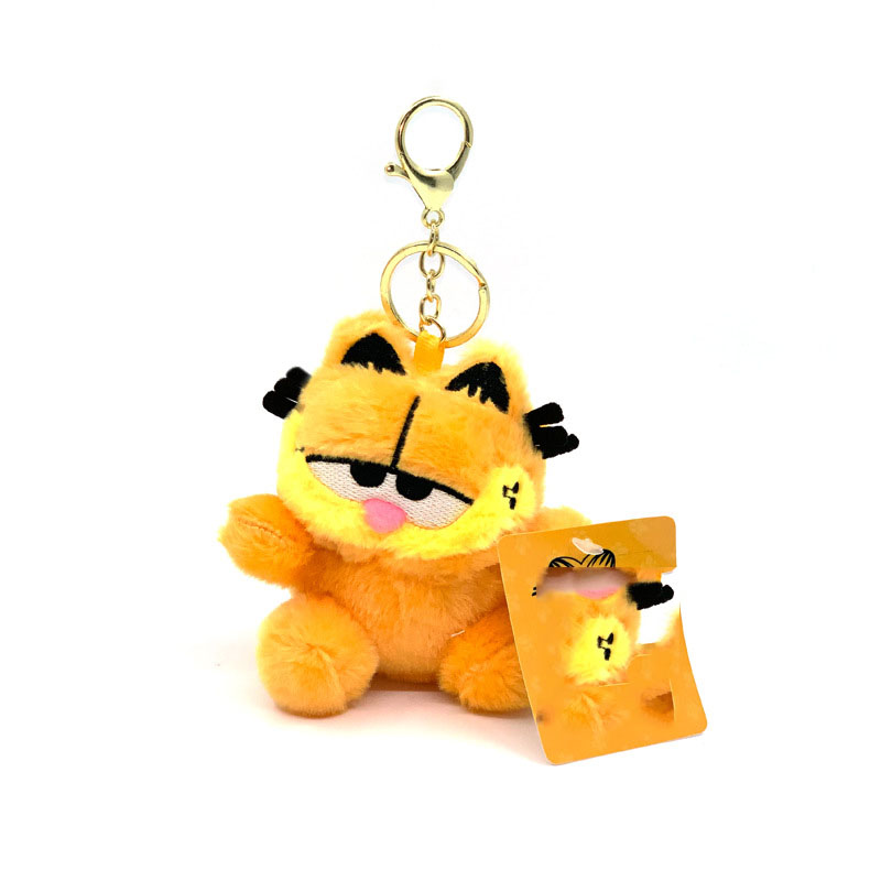 Tecknad söt 4-tums gul katt plysch leksak docka nyckelchain grab dollmaskinpåse hänge