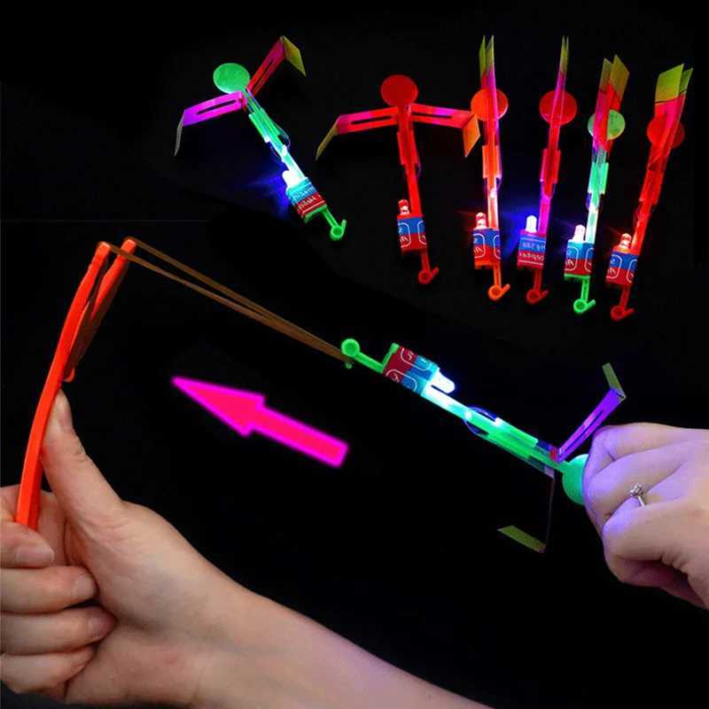 LED Flying Toys Amazing Light Toy Arrow Rocket Helicopter Flying Toy LED Light Toys Glow In The Dark Party Fun Gift Rubber Band Catapult 240410