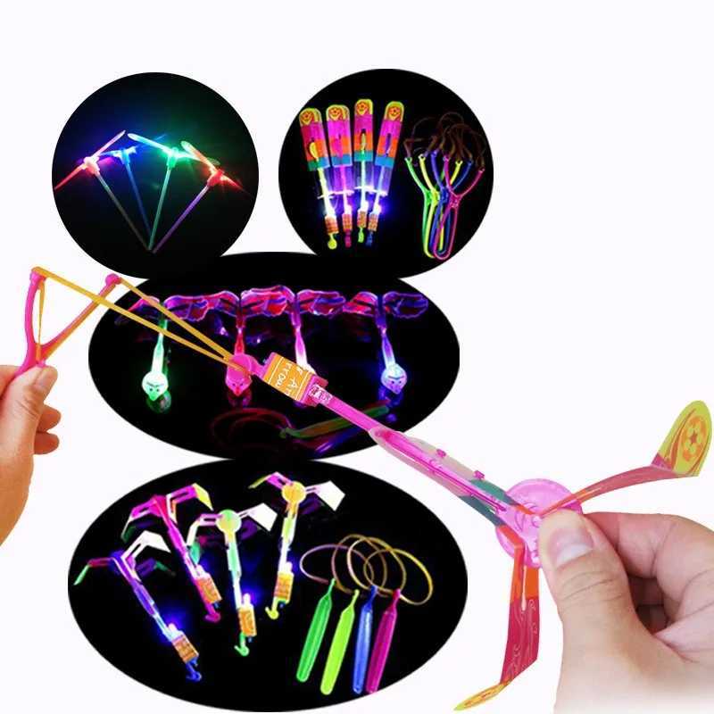 LED Flying Toys LED Flying Toys Outdoor Shining Rocket Flashing Light Slingshot Elastic Helicopter Rotation Flying Kids Toys Gift 240410