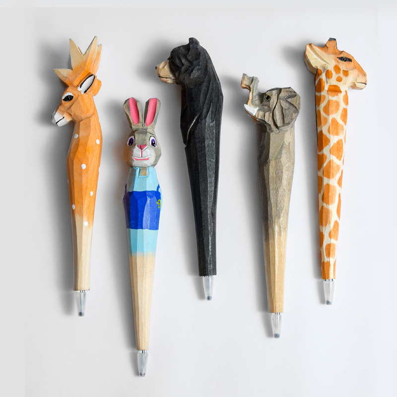 Gel in legno intagliato a mano Elefante Giraffe Penne neutre Strumenti di scrittura carini bambini Funzionalità le forniture bambini
