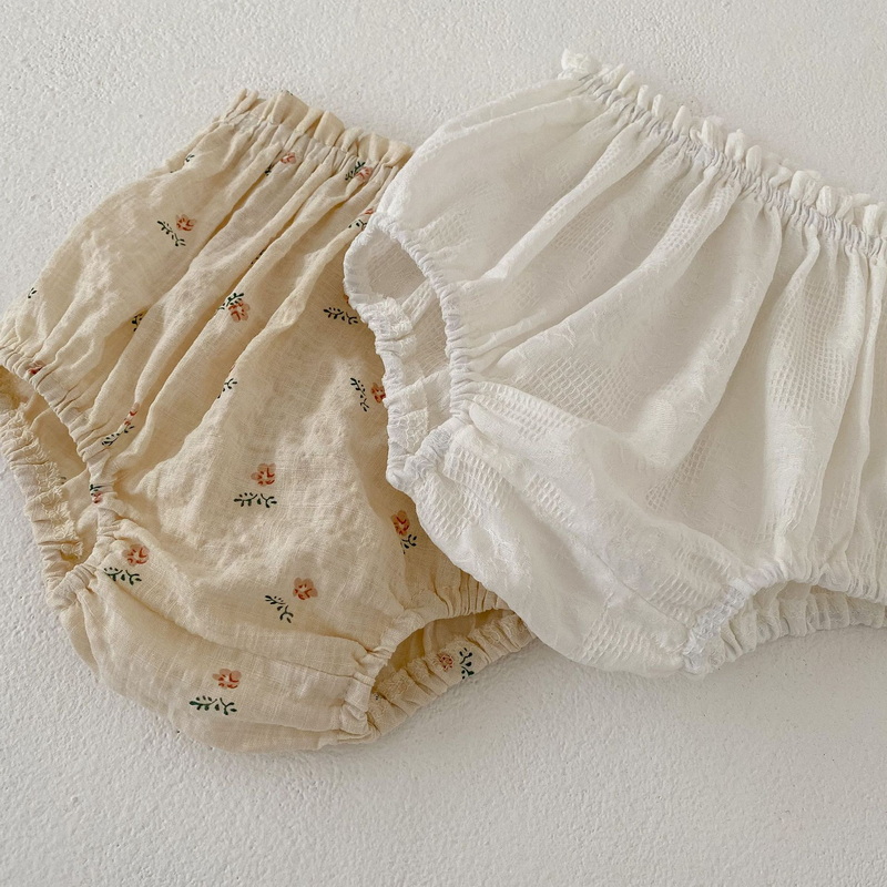 Ny sommarflickan pojke shorts beige aprikos blommig hög midja blöja täcker strängande selvedge pp byxor barn kläder e24070