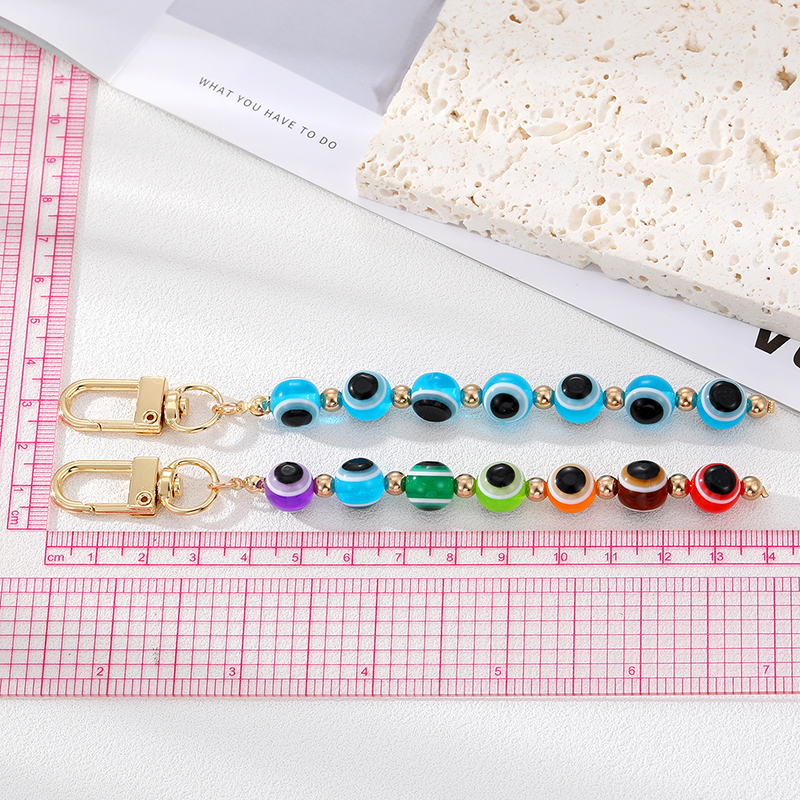 Boho Rainbow Blue Evil Eye Beads Keychain Keychain Key Anneau pour les amants d'amis Round Turkish Lucky Eye Bag Car AirPods Box Clé Accessoires