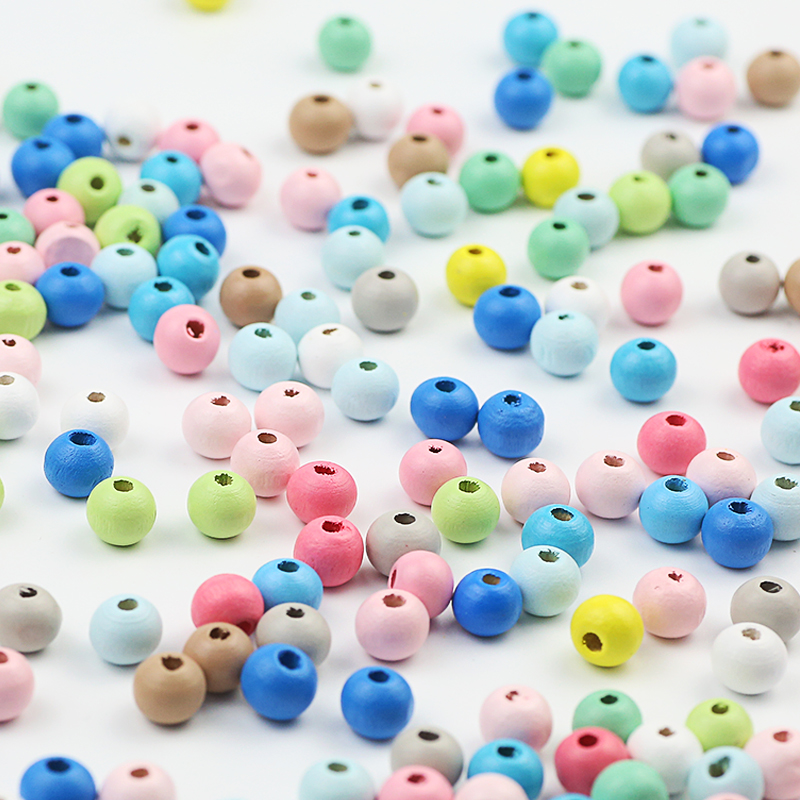 200 pezzi colorati in legno con perle in legno naturale rotonde da 8 mm perle sciolte perle di distanziatore in legno in massa.
