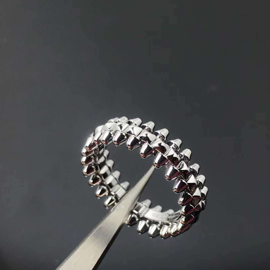 Designer charm Carter CNC Steel Seal Pyramid Ring High Version Rotating Bullet Head Willow Nail Bead Edge Mens and Womens Rings