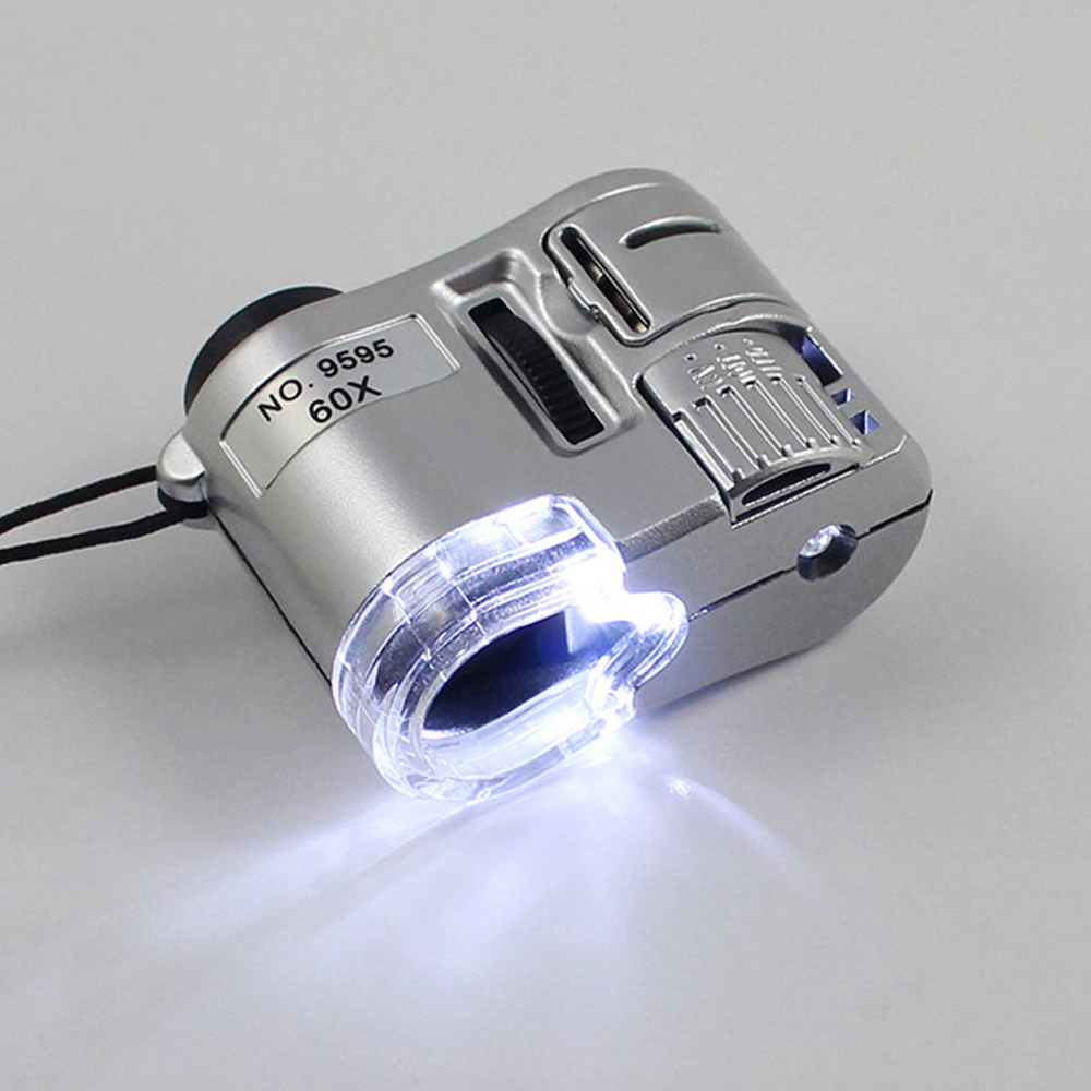 Menificador de mano 60x Mini Mini Microscopio de bolsillo Lupa de lupa Detector de moneda Joya de diamantes con luz LED