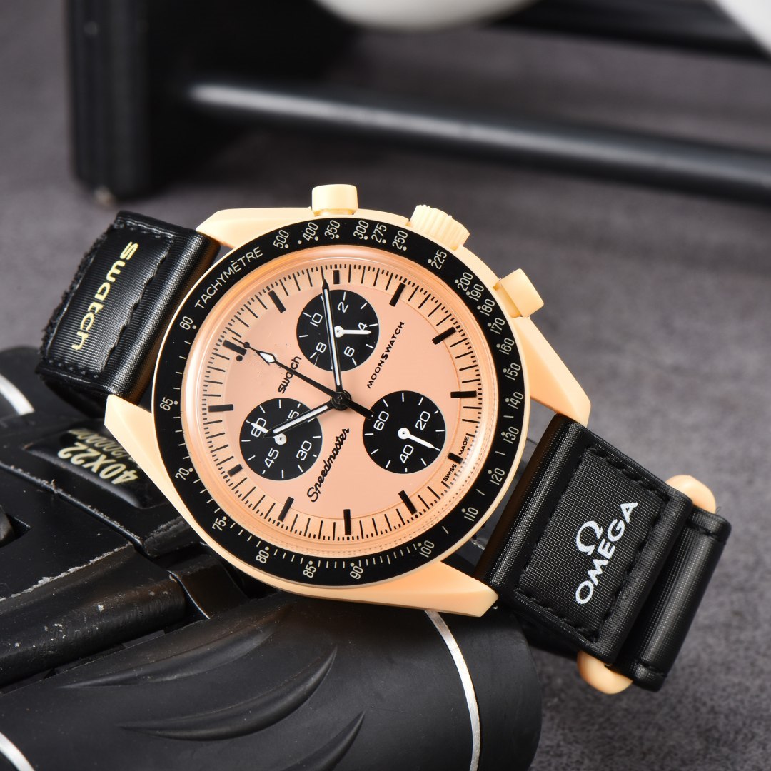 Fine montres masculines et féminines Case en plastique rond trois broches Joix de montre Velcro Strap Quartz Electronic Watch