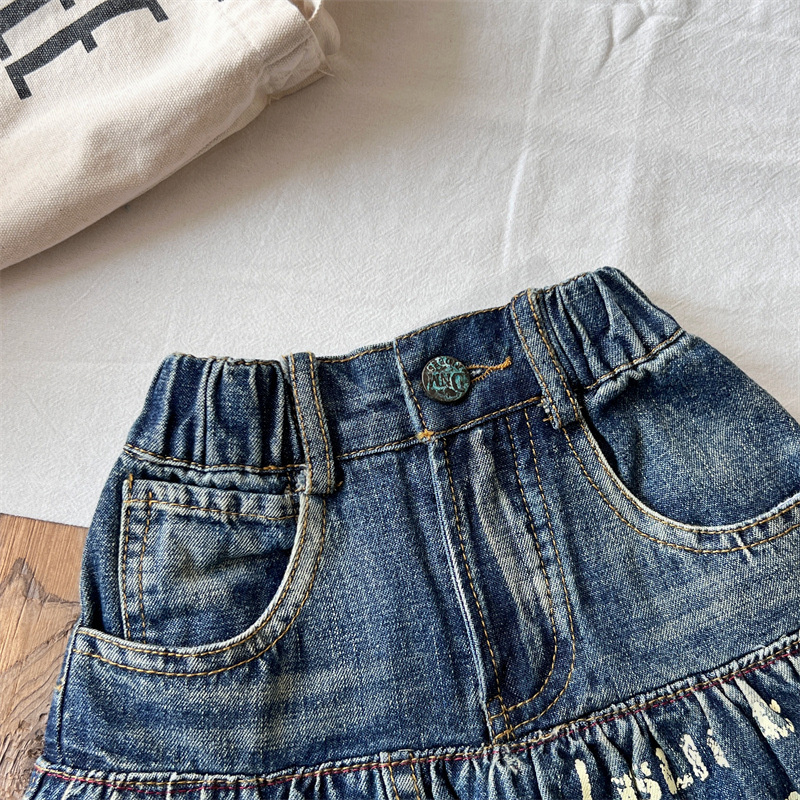 Children Letter Gedrukte denim rokken DD -stijl meisjes elastische taille onregelmatige denim rok mode kinderen designer kleding z7660