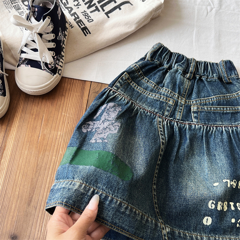 Children Letter Gedrukte denim rokken DD -stijl meisjes elastische taille onregelmatige denim rok mode kinderen designer kleding z7660