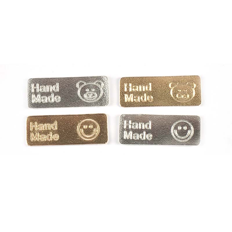 40x15mm argento/dorato Smile orso Modella in pelle Etichette in rilievo Accessori cucire abiti artigianali fai -da -te etichetta fatta a mano