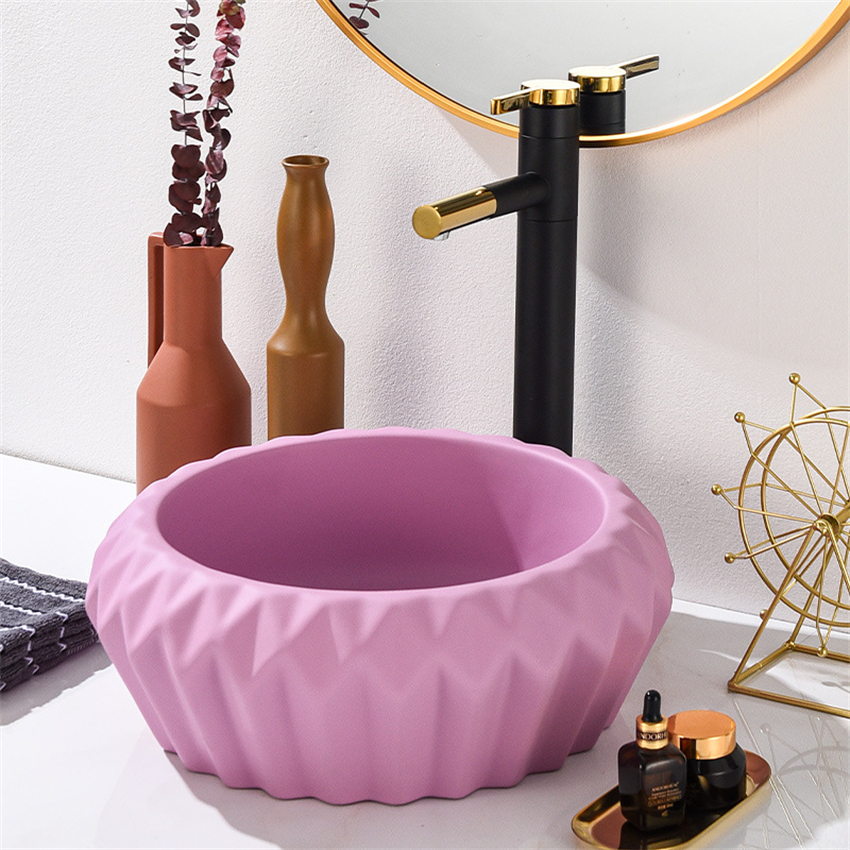 Nordic Creative Ceramic Washbasin Mémale de salle de bain Modern Minimism Restaurant Hôtel Wash Basins Integrated Ceramic Basin