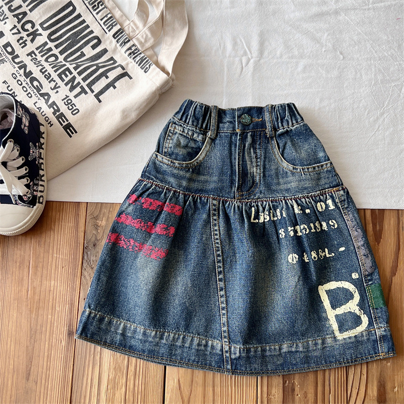 Children Letter Gedrukte denim rokken DD -stijl meisjes elastische taille onregelmatige denim rok mode kinderen designer kleding z7660