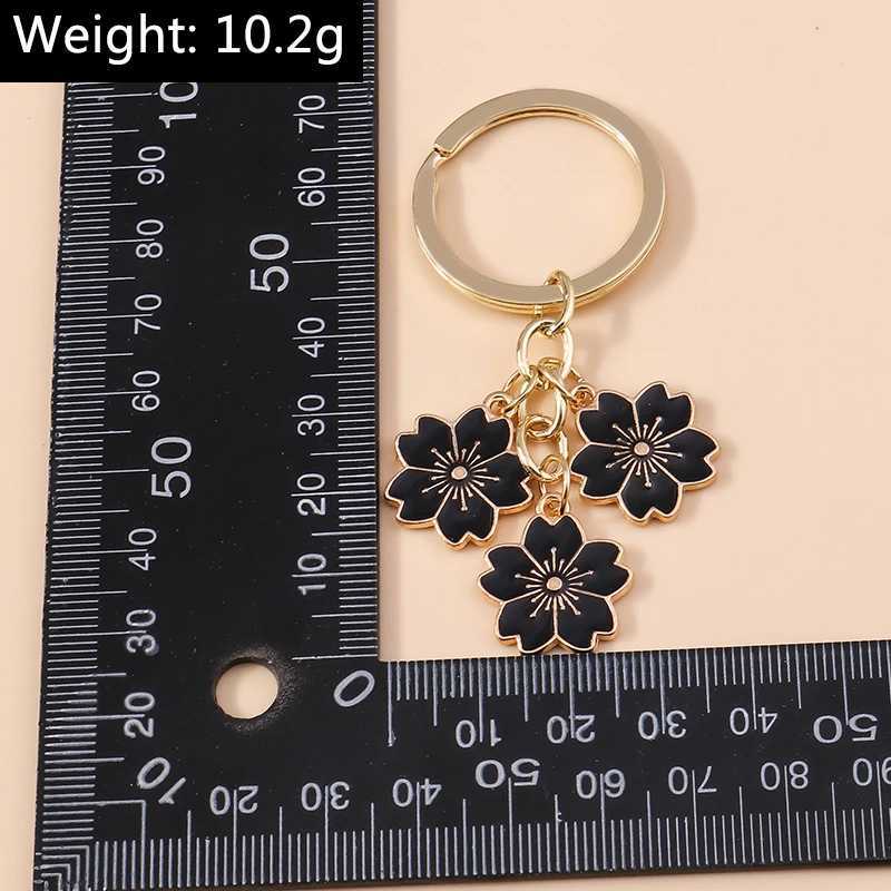 Schlüsselanhänger Lanyards süße Pflanze Schlüsselbund Sakura Blütenschlüssel Ring Emaille Schlüsselketten für Frauen Mädchen Handtaschen Anhänger Auto Schlüsselketten DIY Accessoires