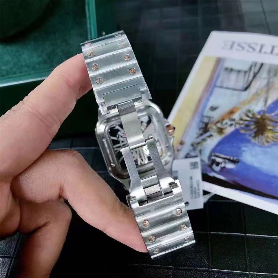 Guarda il designer orologi eleganti e alla moda cinghia d'acciaio importato da uomo impermeabile orologio da uomo e donna orologi TD di alta qualità inossidabile