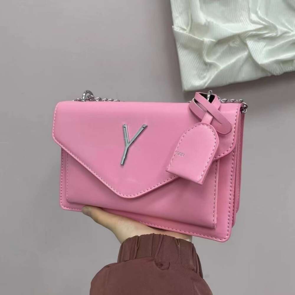 El çantası tasarımcısı, küçük çanta moda ve modaya uygun yüksek kaliteli buz% 60 indirim markalı çantalar satıyor. aynı omuz crossbody zinciri