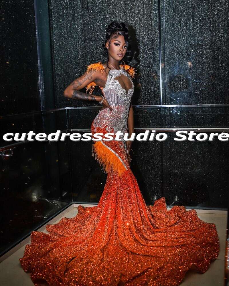 Vestidos de fiesta naranja para chicas negras plumas de diez rianas con lentejuelas de la sirena.