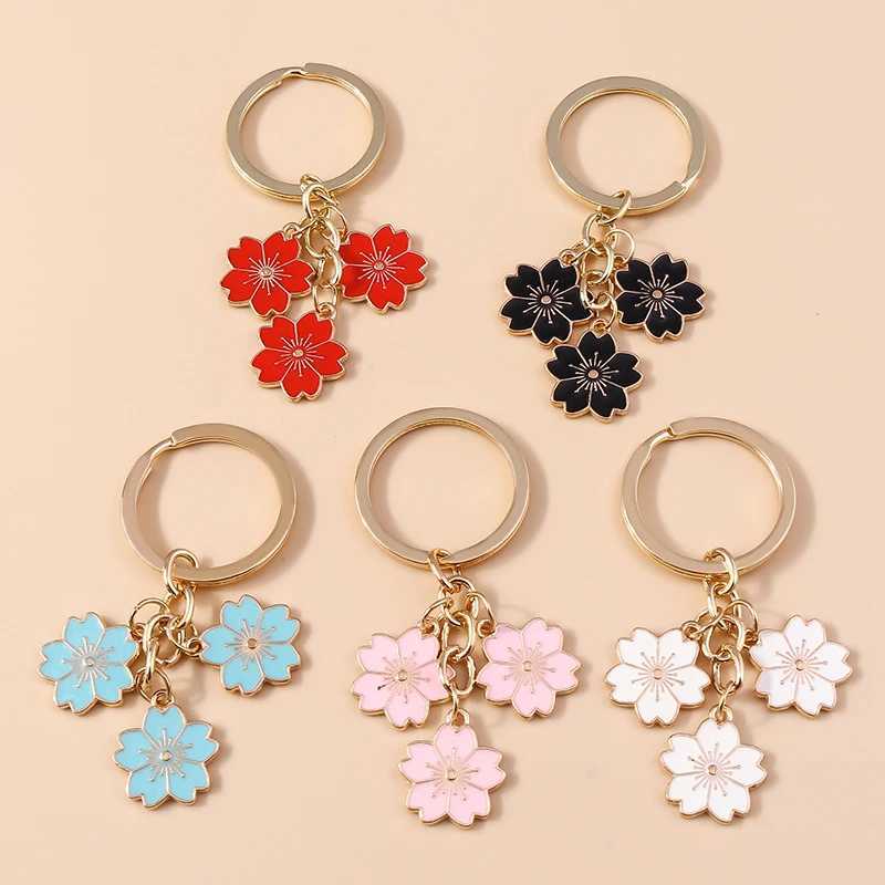 Keychains Lanyards Cute Plant Keychain Sakura Flower Key Ring Enamel Key Chains for Women Girls Handbag Pendants Car Key Chains DIY Accessories